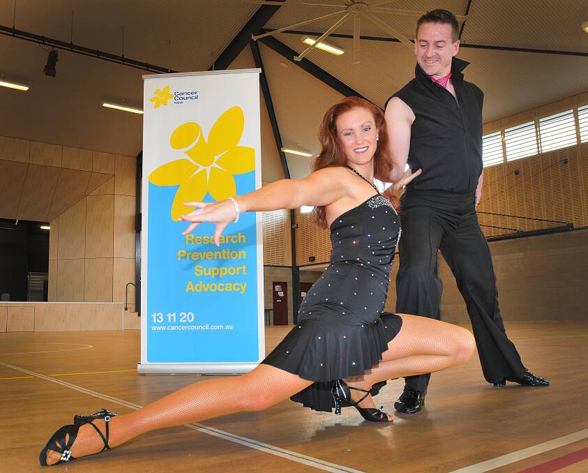 READY TO RUMBA: Celebrity Dance for Cancer contestants Sarah and Chris Tice are set to wow the crowds at tonight’s charity event. Photo: Geoff O’Neill 130614GOC03