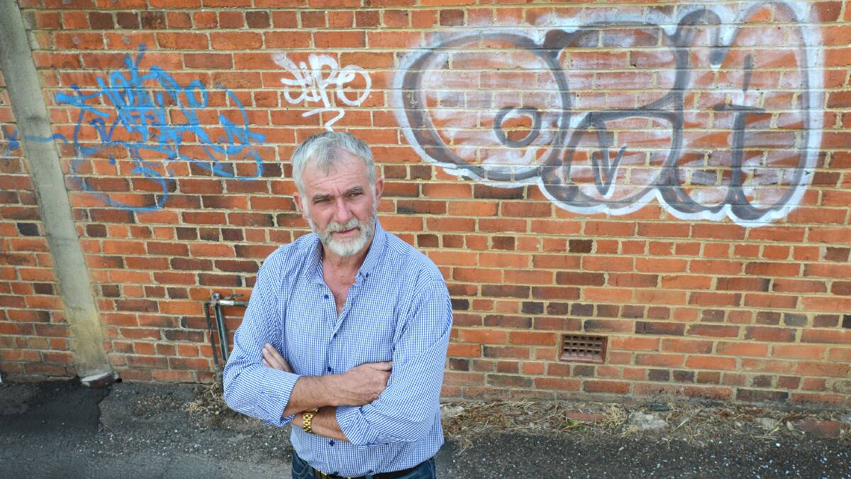 FED UP: Chairman of Tamworth’s Crime Prevention Committee, councillor Russell Webb, has applauded the arrest of three suspected graffiti ringleaders. Photo: Barry Smith 070314BSC04