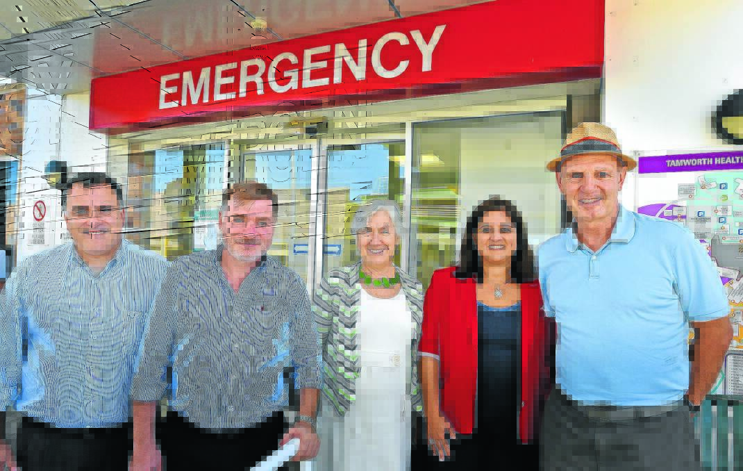 LIKE WHAT THEY SEE: Visiting Argentinian professors (first, second and fourth from left) Horacio Sagardoy, Ricardo Escowich and Larisa Carrera, were impressed with Tamworth’s facilities during their visit. They’re pictured with the director of the Department of Rural Health at the University of Newcastle, Nicky Hudson (middle), and Professor Victor Minichiello (right). Photo: Geoff O’Neill 250315GOF01