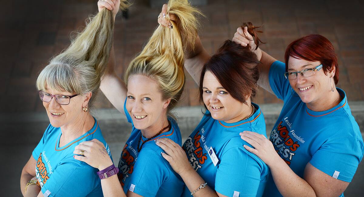 HAIR TODAY: Best Western Sanctuary Inn front-of-house employees Terri Morris, Simone Parsons, Jay Herden and Michelle Boulton will be taking part in the World’s Greatest Shave in March next year. Photo: Barry Smith 121114BSC01
