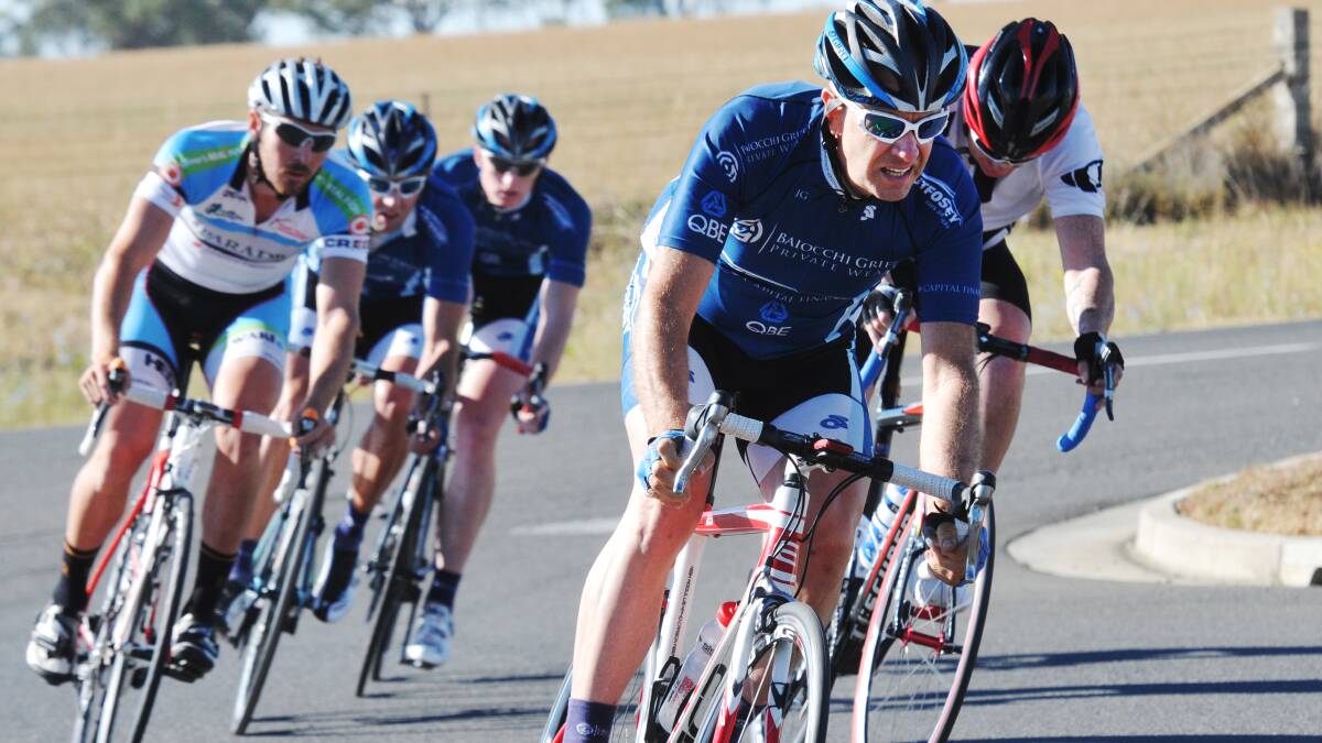 Ray Griffin leads Brendan Hallford, Mitch Carrington and Phil Kelleher into a turn in a recent A Grade criterium. Photo: Geoff O’Neill 190114GOA03