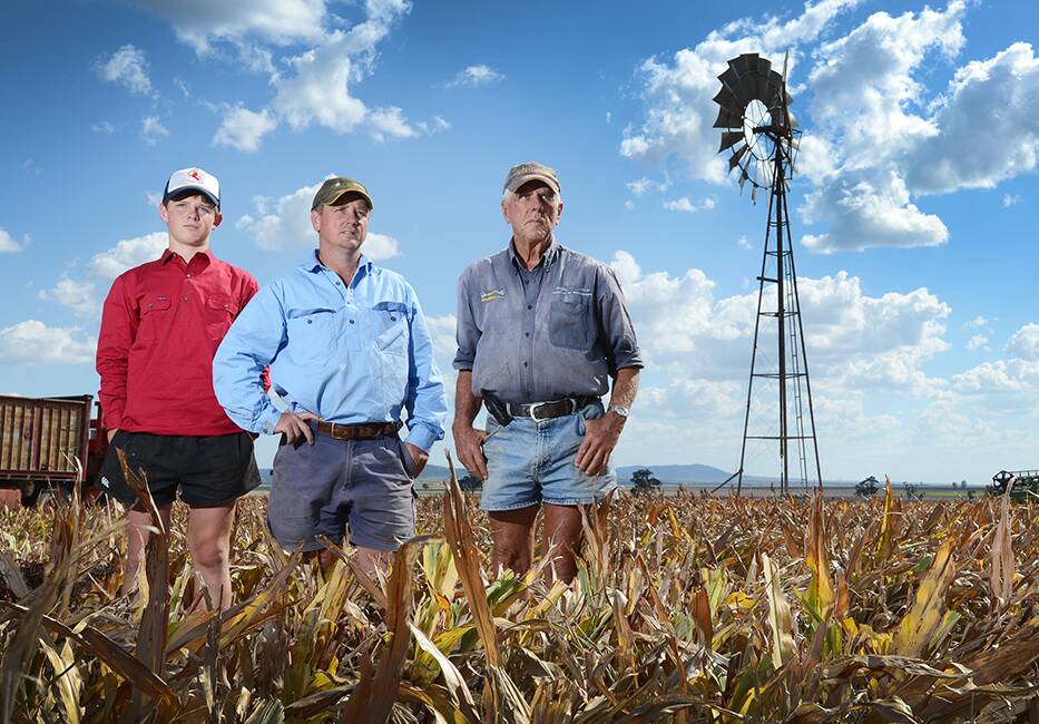 WHAT FUTURE? The Grant family of Caroona, including Ben, 13, his father Rod and grandfather Allan, ponder their future in farming after a report revealed potentially catastrophic impacts on their groundwater from a proposed mine. Photo: Barry Smith 230414BSA10