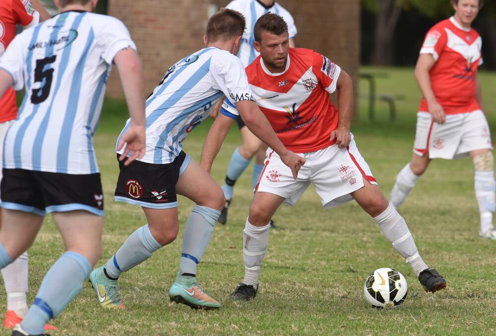 OVA stalwart Adam Watson looks for an opening in Saturday’s 4-1 win over Tamworth FC. Watson scored one of the four Mushie goals.Photo: Geoff O’Neill 020515GOF04