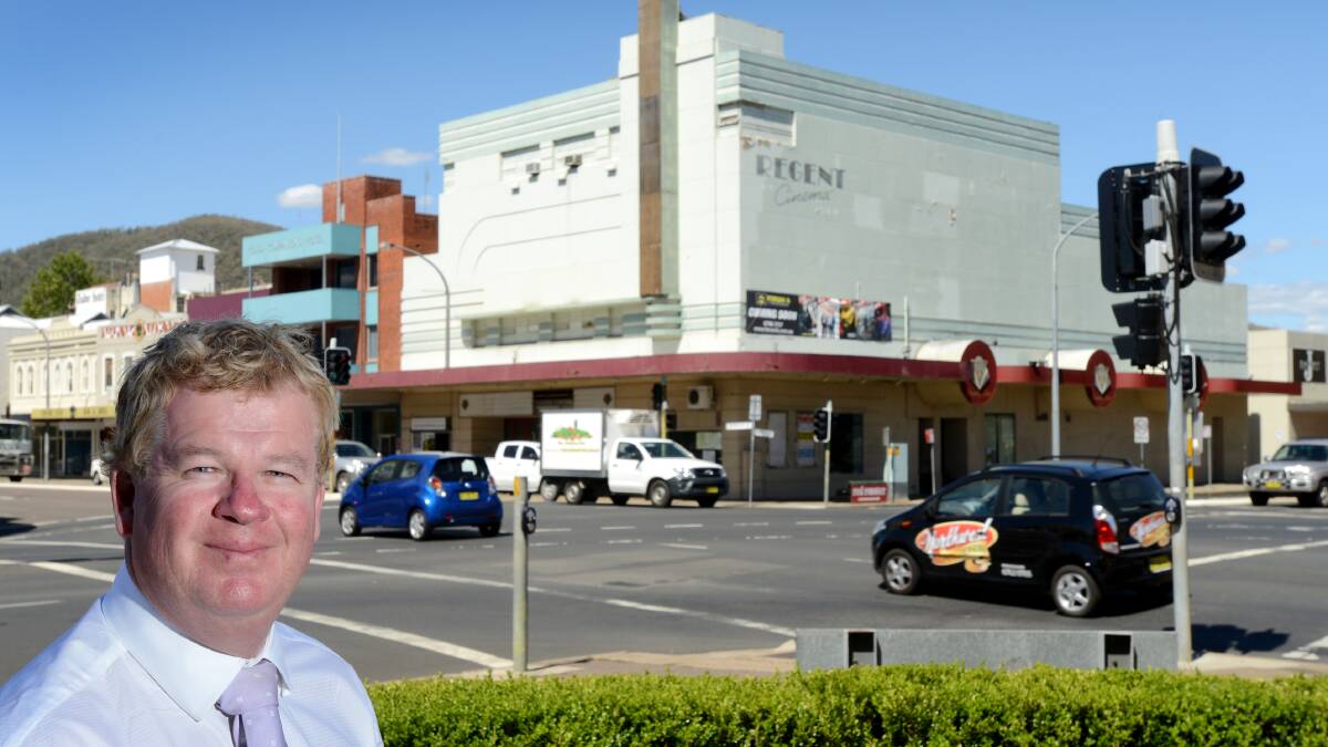 CHANGING FACE: Local real estate agent Paul Ashcroft near the Regent 
Cinema, one of a host of iconic 
buildings in 
Tamworth sitting vacant. 
Photo: Barry Smith. 240214BSE01