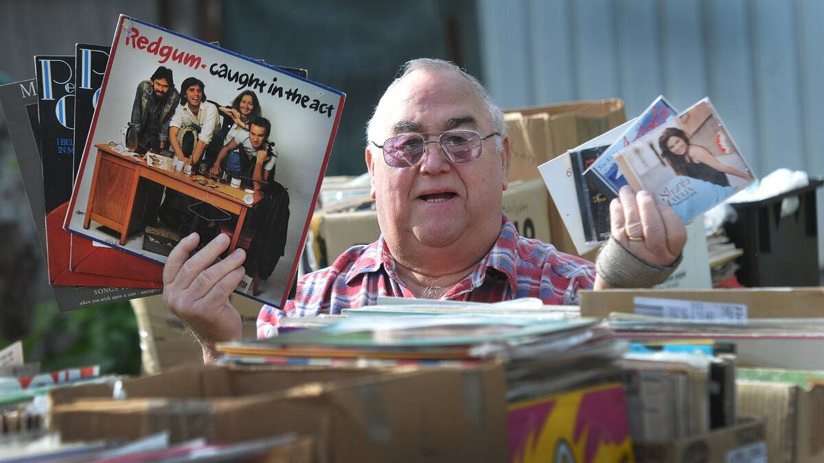 MUSIC MANIA: Errol Bourne is selling off most of his record and CD collection this weekend. Photo: Geoff O’Neill 070514GOB01