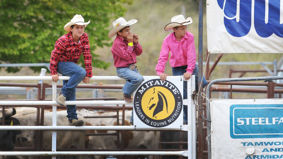 Zac McKee, Braith Nock, Riley Reid cheer on the senior cowboys at the recent Bendy Rodeo. 
Photo: Gareth Gardner 160214GGD15