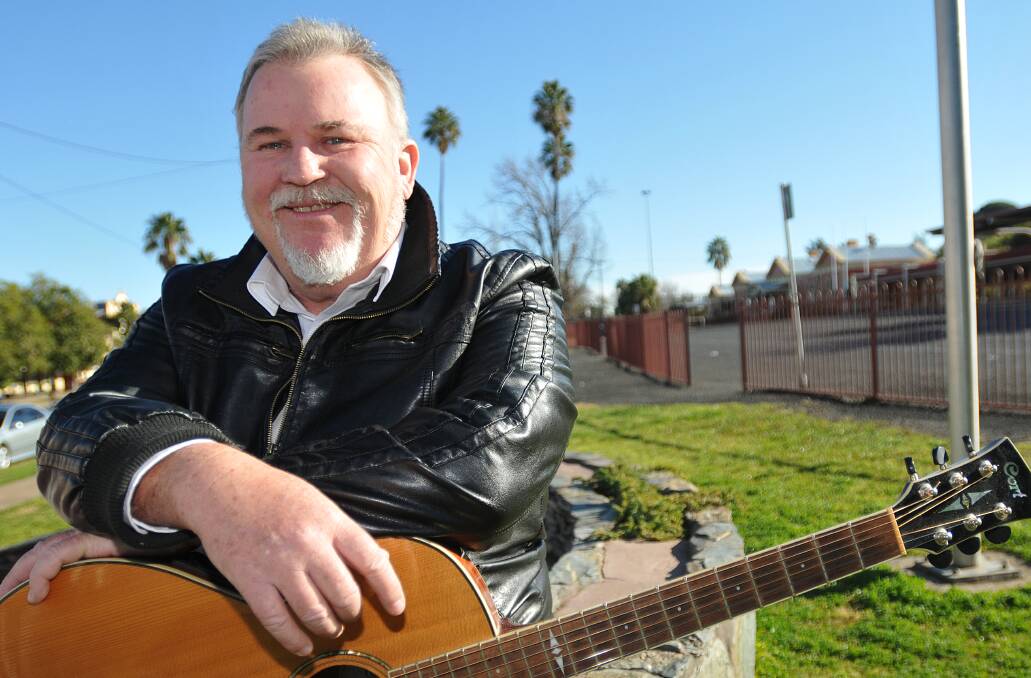 STRIKING A CHORD: Local musician Steve Charles has penned a new song to support the push to decriminalise medical marijuana for the dying. Photo: Geoff O’Neill 230714GOA02