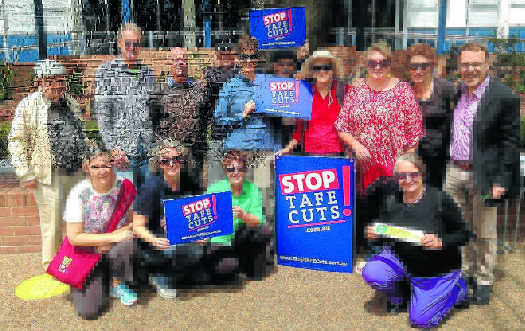 UNITED STAND: Dr John Kaye, far right, with Armidale opponents of planned changes to TAFE.