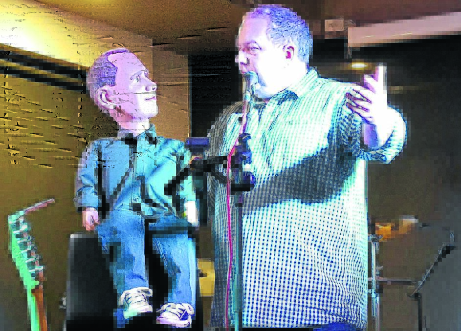 CHEEKY: Darren Carr brought his little wooden mate out of the box for his Hats Off finale gig at South Tamworth Bowlo. The cheeky puppet made a play for Werris Creek singer Marie Hodson.