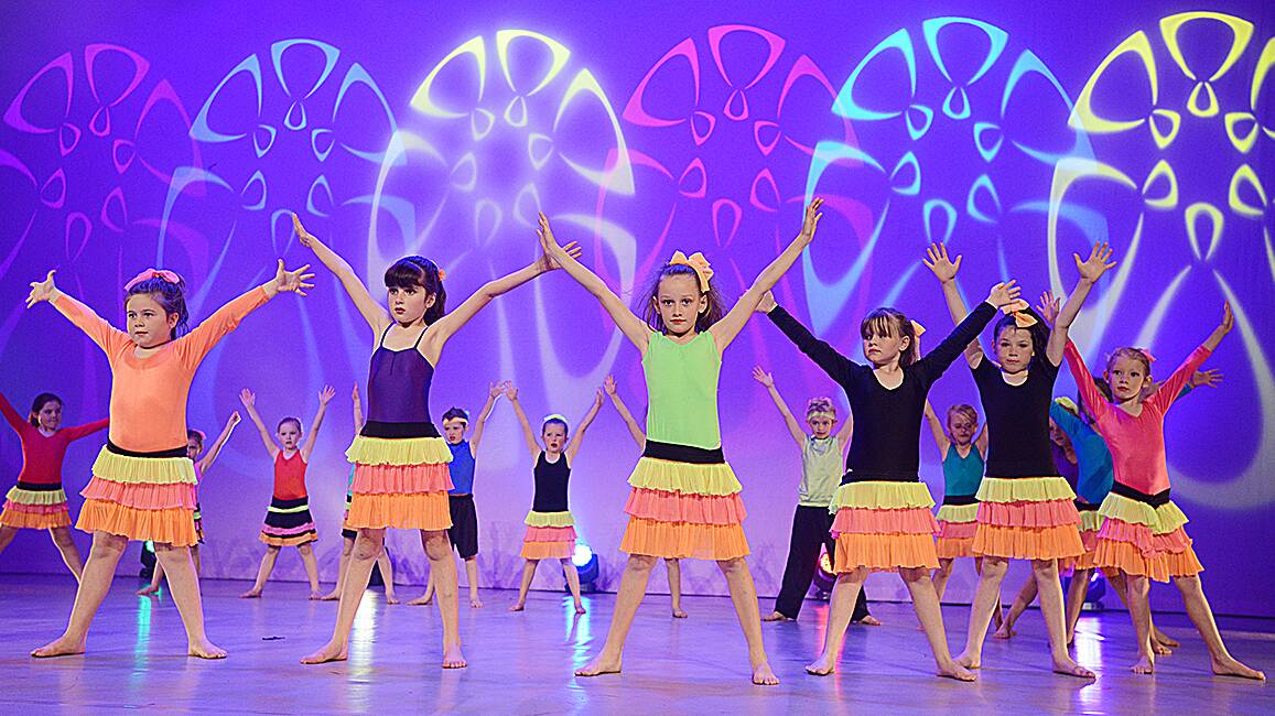 TWINKLE TOES: From left, Quirindi Public School Year 1 and 2 students Jessica Golland, Ruby Uptin, Lilly Owen, Evie Gimbert, Bridie Palmer and Lacey Owen perform at Dance Festival 2014. Photo: Barry Smith 140814BSB52