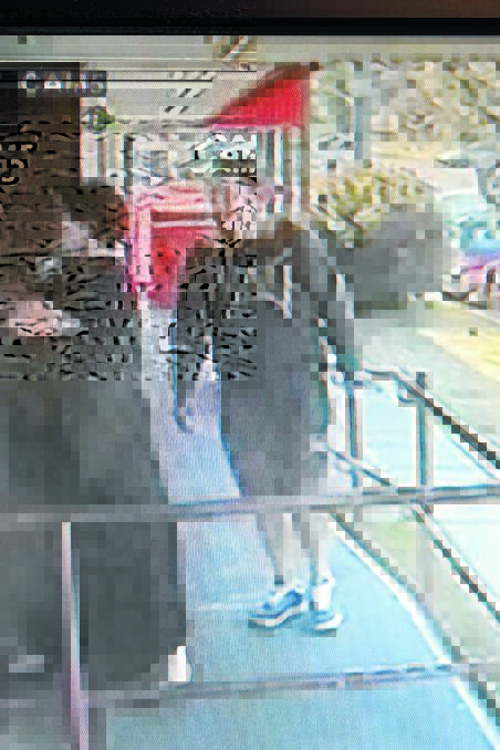 CCTV footage shows a man walking in empty-handed and then walking out with the bucket.