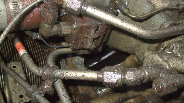 ENGINE FAILURE: A hole in the right side of the crankcase was discovered in the wreckage.