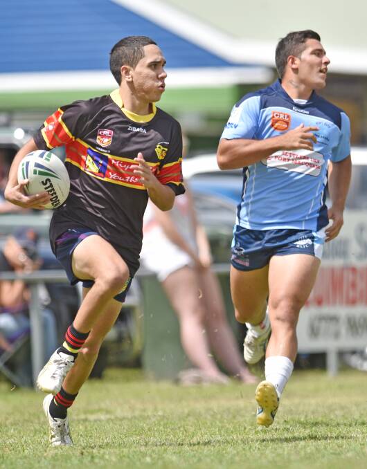 Caleb McGrady has already got coaches drawing parallels with his famous uncle Ewan after the 17-year-old halfback starred for the Boomerangs as they won the first Armidale Rams Nines on Saturday.  Photo: Barry Smith 280215BSA76