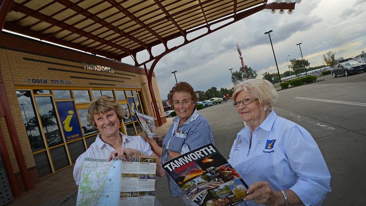 SHUTTING UP SHOP: Tourism guides Kim Swab, Kay Reid and Joan Crosling had the last shift yesterday providing visitor information from the old guitar-shaped centre at Paradise. Photo: Gareth Gardner  231014GGB01