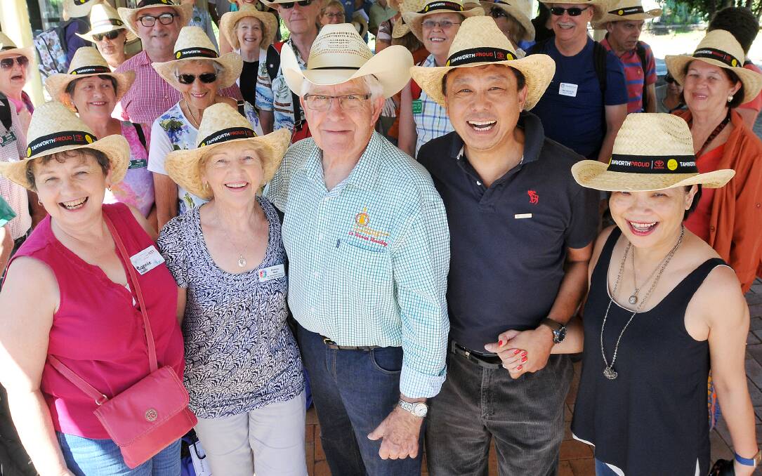 CULTURES COMBINE: Fresh off the train and ready to soak up the Tamworth Country Music Festival are Connie Williams (Iowa, USA), Audrey West (Nelson, NZ), Tamworth councillor Warren Woodley, Eade Wang and Fenny Gee (Taiwan). Photo: Gareth Gardner 170115GGG01