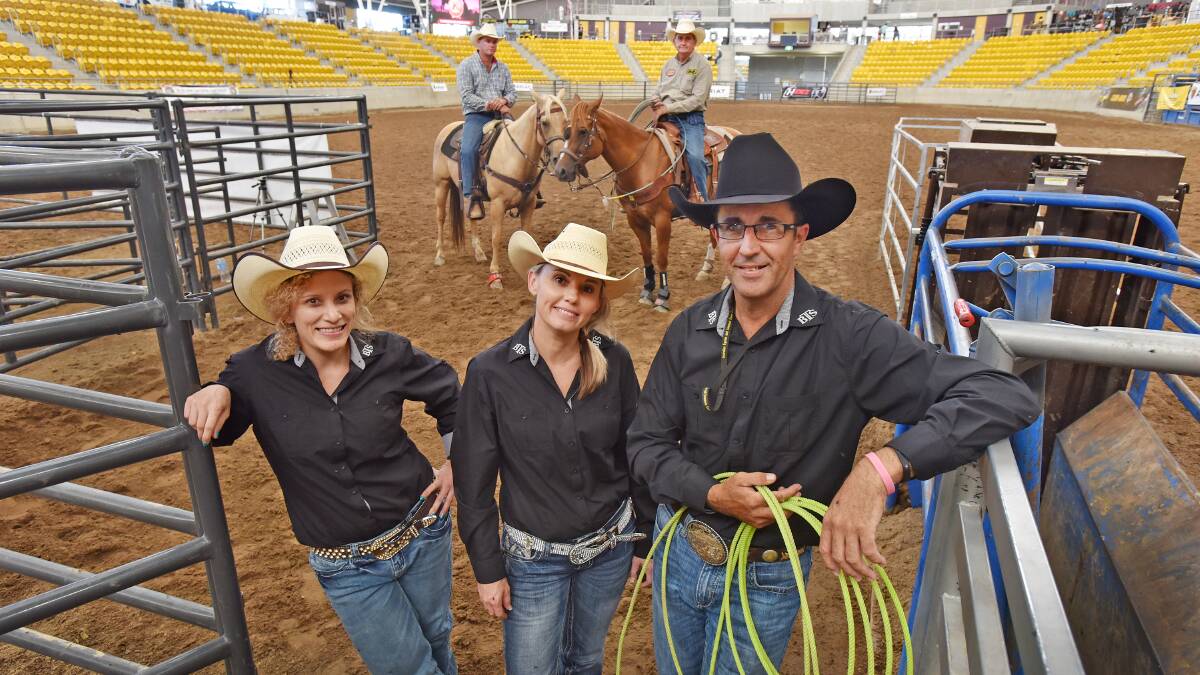 Jade Michel, Melissa McGhee and Wayne McGhee are behind the Big Show Team Roping Championships at the AELEC this week that has blown people away with the size of its prize pool. Clancy Middleton Jr and Paul Parker (behind) will be roping for a chance at the bounty. 
Photo: Barry Smith 180215BSH02