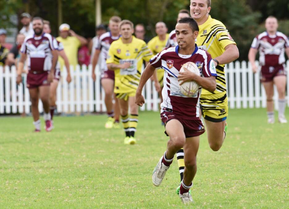 Little Lions fullback DylanLake on his way to one of four tries in last Saturday’s demolition of Oxley Diggers. Today’s match is a different matter for the lightning quick  number one and his teammates against reigning premiers North Tamworth. 
Photo: Geoff O’Neill 180415GOE08