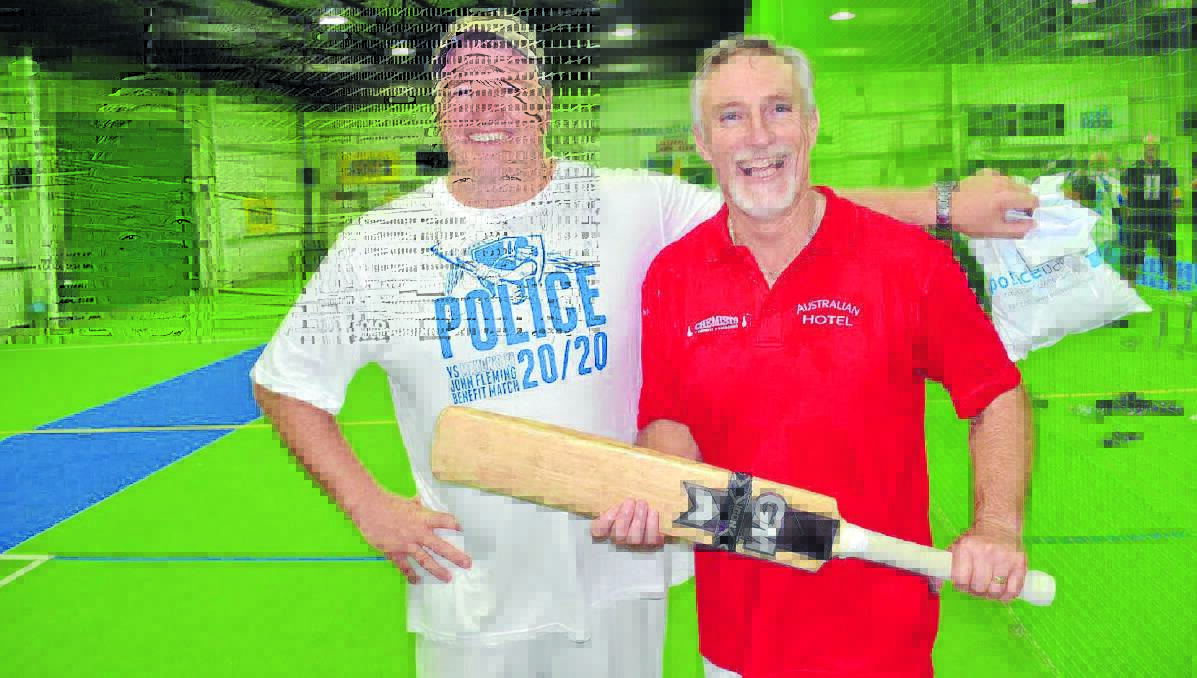 HEAD TO HEAD: Police captain Inspector Rowan O’Brien was all smiles despite his side going down to mayor Paul Harmon's in the charity fundraiser. Photo: Inverell Times