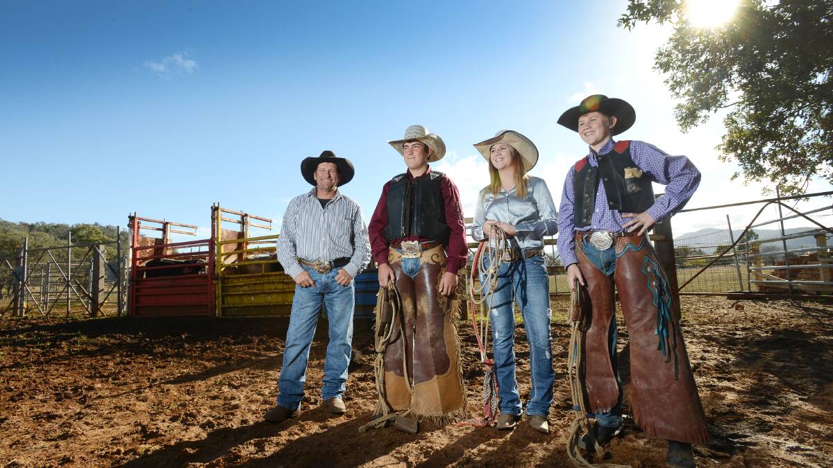 SPURRED ON: From left, Kevin Cooper, James Vaughan, Tammy Pittman and Jack Pittman saddle up for tomorrow’s rodeo at the Moonbi Showground. Photo: Barry Smith 240614BSB01