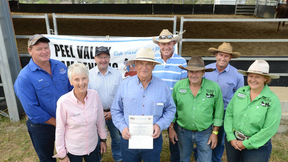 Peel Valley Team Penning made a presentation to Riding for the Disabled on the weekend. Pictured are (front from left) Gill and  Colin Rosewarne (Riding for Disabled), Ron Grant and Deby Stocks (Peel Valley Penning) and (back from left) Gavin Sutton (GDS Heavy Haulage), Brian Penrose (Penrose Meats), Rodger Grant and Phil Elliott (Koobah Performance Horses).  Photo: Barry Smith 270414BSA02