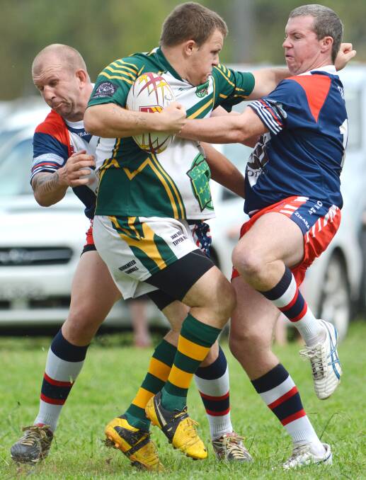 Bendemeer’s Mick Allen runs headlong into Kootingal’s Mitch Baker in a first-round clash. Today Bendy are at home while Kootingal plays a Group 4 double header at Manilla.  Photo: Barry Smith  050414BSE17