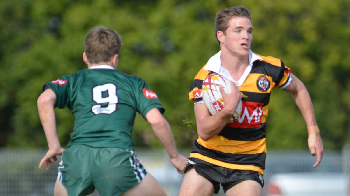 Westbrook’s Kydan Howard on the attack for the Greater Northern Tigers in their Country Championship Under 16 final win over Western at Scully Park earlier this year. Howard has been named in the new GN Academy that will assemble in Tamworth tomorrow. Photo: Barry Smith 210614BSA35