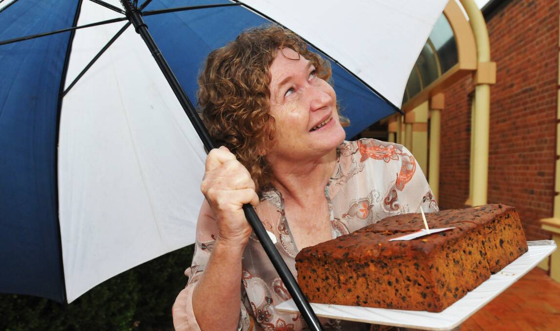 HEAVEN-SENT: CWA group cookery officer Pam Wright might have wanted to have her cake and eat it too when it came to cooking and what was falling out of the clouds. She was at a cake competition in Tamworth. Photo: Geoff O’Neill 2101314GOD02