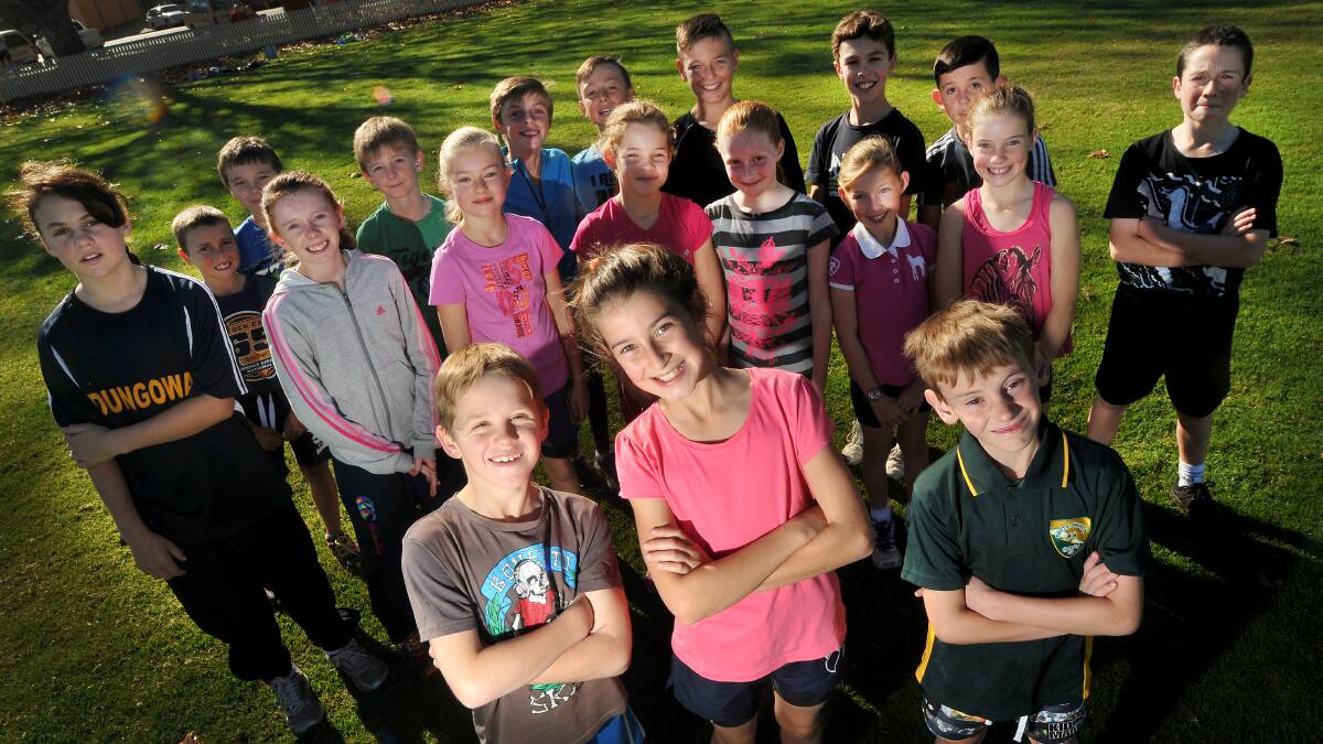 Aiden Wall, Paige Levingston and Campbell Lewis (front from left)  will be part of the team of 48 representing Tamworth Zone at the Regional Cross Country titles tomorrow. Members of the team (pictured here) have been hard at training all month.  
Photo:  Gareth Gardner  090614GGA02