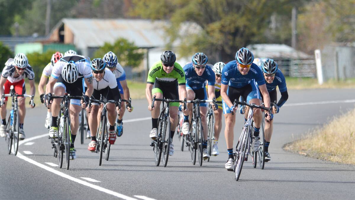 Jeremy Bartlett (right) hits the after-burners to power to a welcome Calala Inn Nemingha-Nundle-Nemingha Road Race victory yesterday. Photo: Barry Smith 180514BSC02