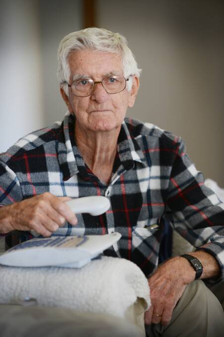 JUST HANG UP: South Tamworth pensioner Walter Scott was one of a number of local seniors targeted in a bank scam recently. Photo: Barry Smith 290514BSB03