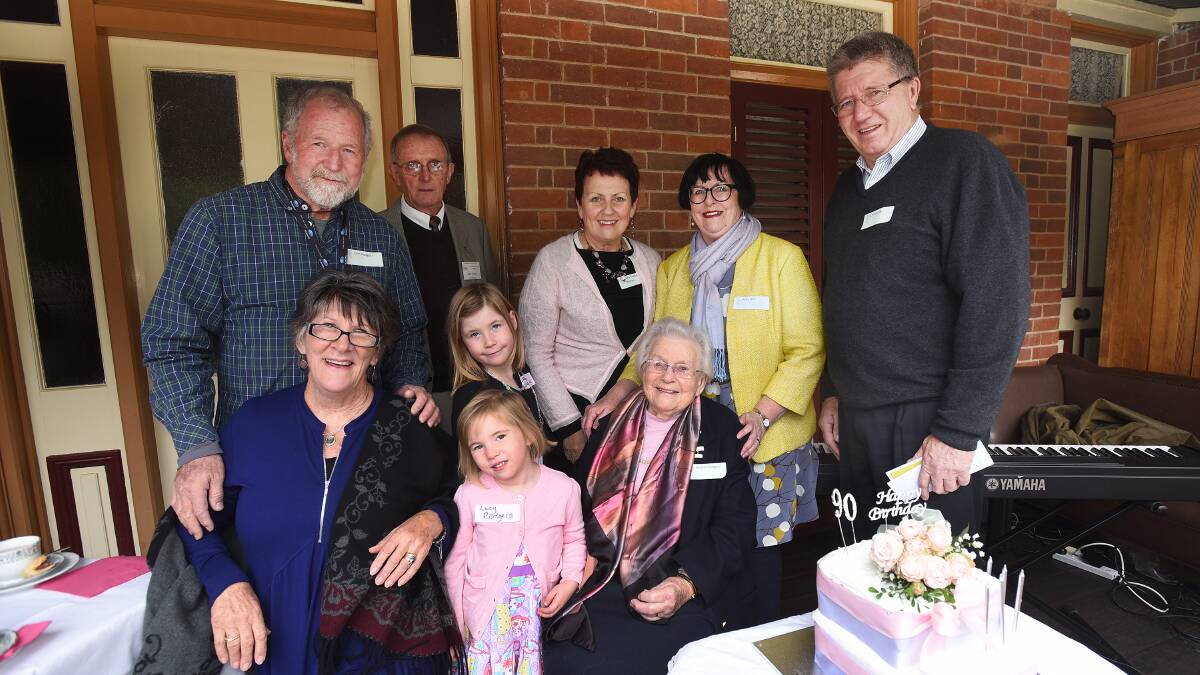 FAMILY FANFARE: Among the family and friends joining Audria Rodgers for her 90th birthday were, back from left, son John Rodgers, John Vickery, Libby Rodgers, Anni Gee and mayor Col Murray, and front,  Jenny Rodgers, Chloe Rodgers and Lucy Rodgers with the birthday girl Audria. Photo: Gareth Gardner  260415GGE01