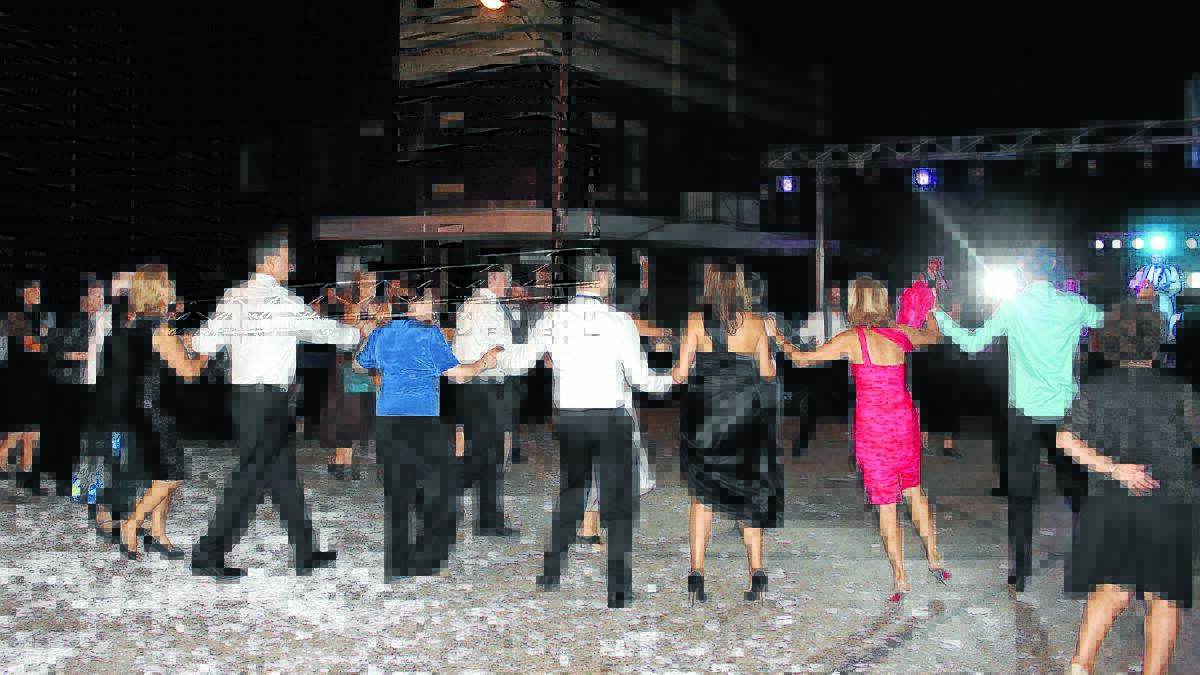 DANCING TOO: Greek dancing was held after dinner in the main street of Bingara. 
Photo:  Louise Campbell