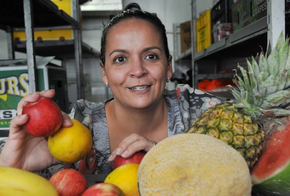 KIND-HEARTED: Kate Hawkins, who owns Tamworth fruit and vegetable wholesaler Fresh n Fast with her husband, Anthony, will donate food to help homeless people. Photo: Geoff O'Neill 180214GOE02
