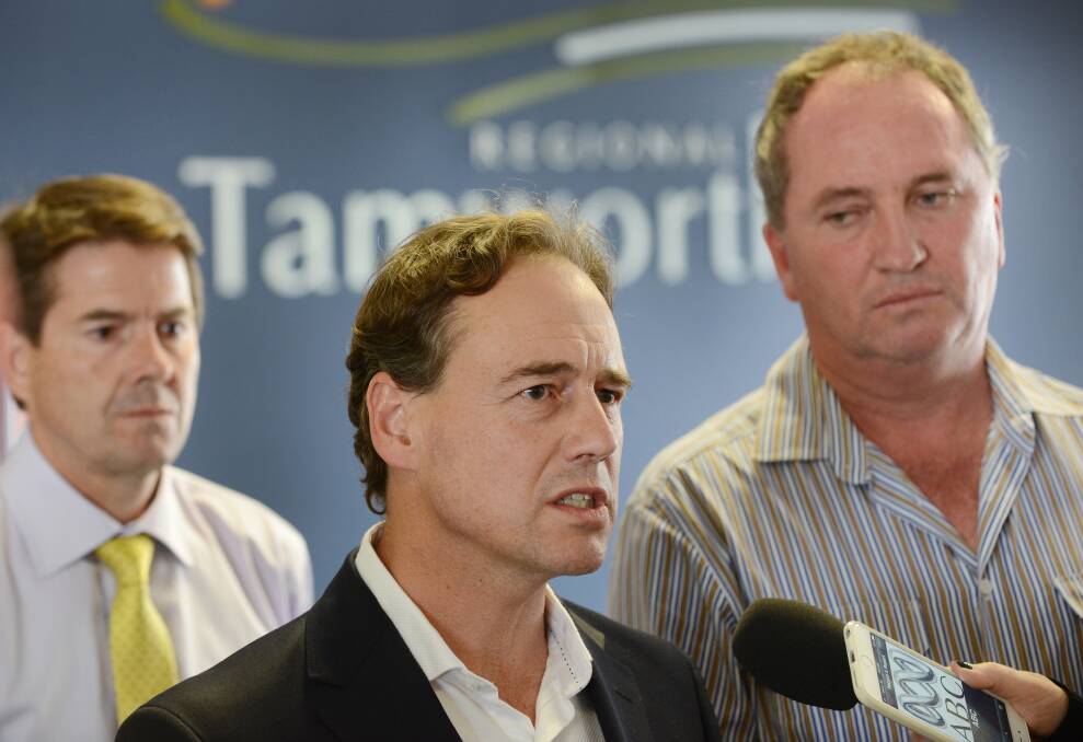 HALT: Federal Environment Minister Greg Hunt, centre, flanked by National Party state and federal members, Kevin Anderson, left, and Barnaby Joyce. 
Photo: Barry Smith 270215BSC17