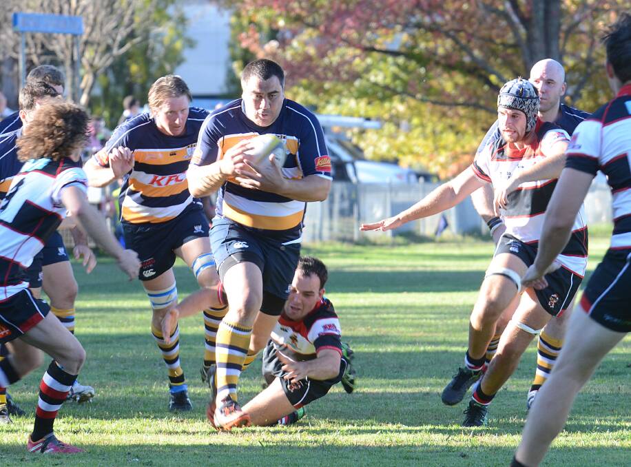 Armidale back rower Mike Te Moana on the charge against  Barbarians last week after coming off the bench. The Blues don’t play this weekend but TeMoana will be co-coaching the Town side in Sunday’s special ANZAC clash. Photo: www.pixonline.com.au
