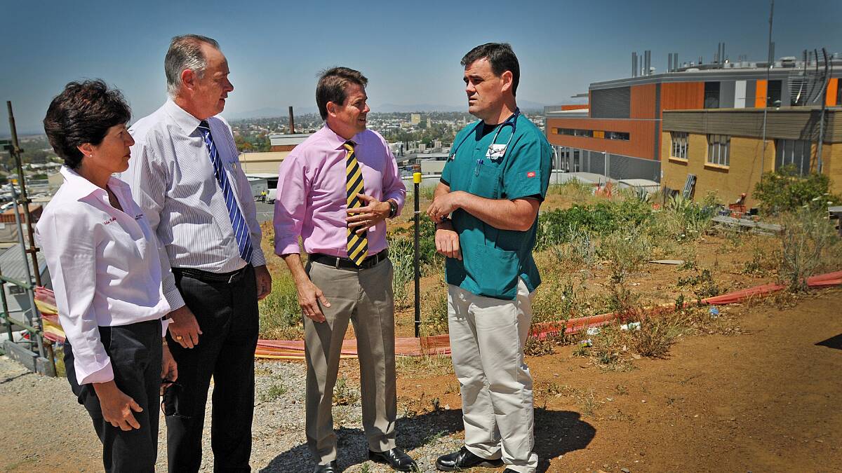 LIFTOFF: Announcing a new helipad for Tamworth hospital are Cr Helen Tickle, Tamworth hospital general manager Brad Hansen, member for Tamworth Kevin Anderson and Dr Chris Trethewy. 
Photo: Geoff O’Neill 311014GOB01