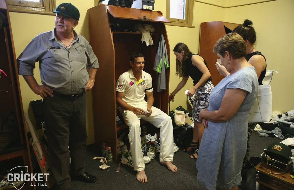 Josh Hazlewood’s father Trevor tries on his son’s baggy green as the family celebrate the end of the Josh’s second Test appearance. Photo: cricket.com.au