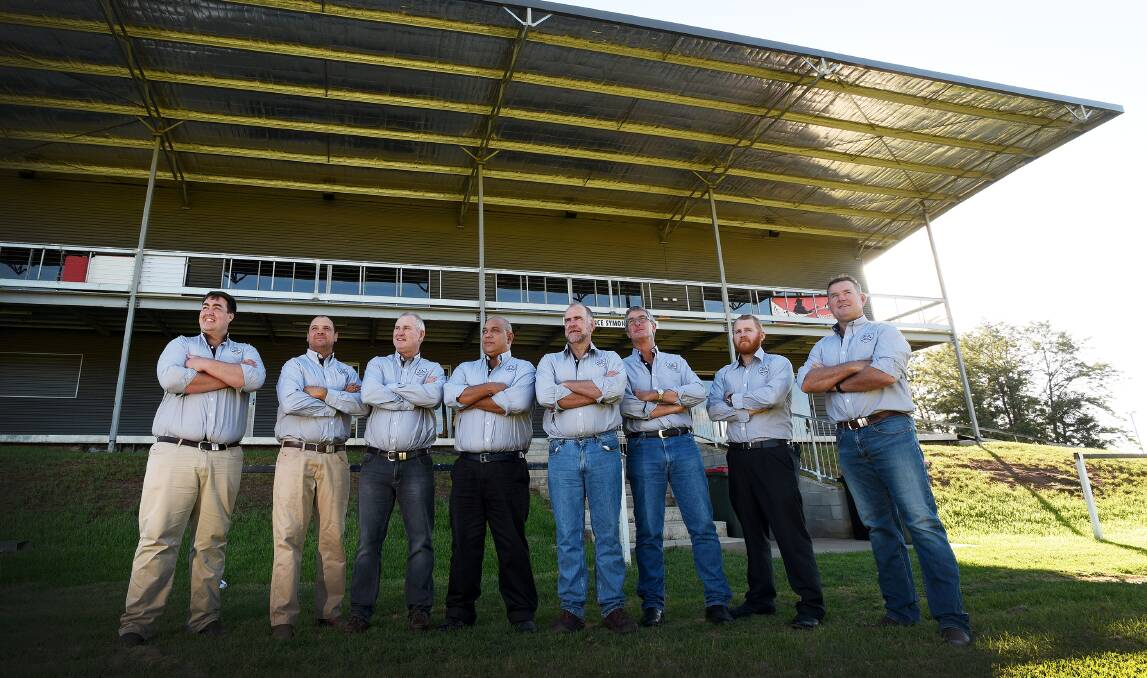 Lining up to coach the Magpies this season are (from left) Sam Scott, Bernie Klasen, Kevin Dickie, Kevin Rooney, Chris Collins, Murray Lang, Brent Robinson and Bernie Williams, along with Dick Leonard (absent)  Photo: Gareth Gardner  050215GGDO1