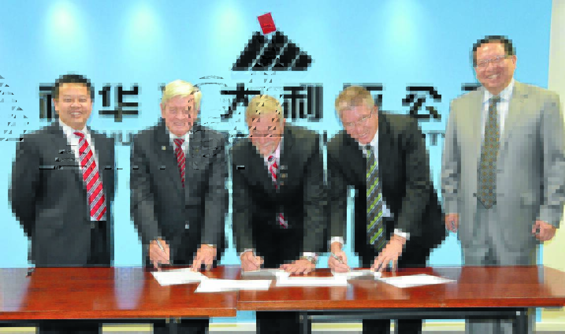 ON THE DOTTED LINE: Pictured at the signing of the in-principle agreements are, from left, Shenhua Watermark chief executive officer Wang Ningbo, Liverpool Plains mayor Ian Lobsey, Gunnedah shire mayor Owen Hasler, Tamworth Regional Council mayor Col Murray and Shenhua chairman Liu Xiang. 
Photo: Namoi Valley Independent