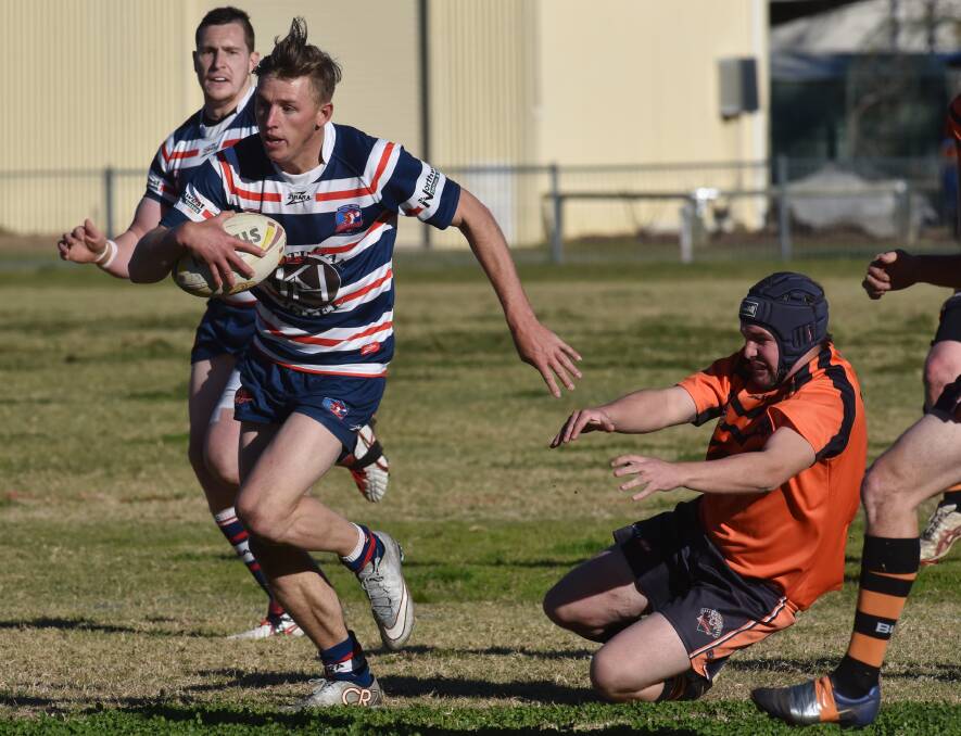 Kootingal centre Ryan Martin on the attack for his Roosters with prop Shaughn Stevenson in support in Saturday’s 116-nil win. Martin kicked 18  goals and scored two tries for a 44-point personal haul. Photo: Geoff O’Neill 270615GOE02