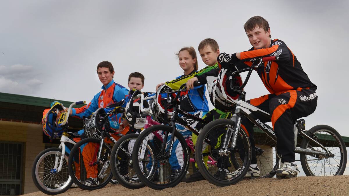 In the Tamworth BMX team to compete at the ACT titles this weekend are (from left) Dan Morris, Mason Heywood, Kaitlyn Heywood, Justin Eunson and Jayden Eunson. Jack Davis and Martin Heywood (absent) will join them.  Photo: Christopher Bath 260214CBA01