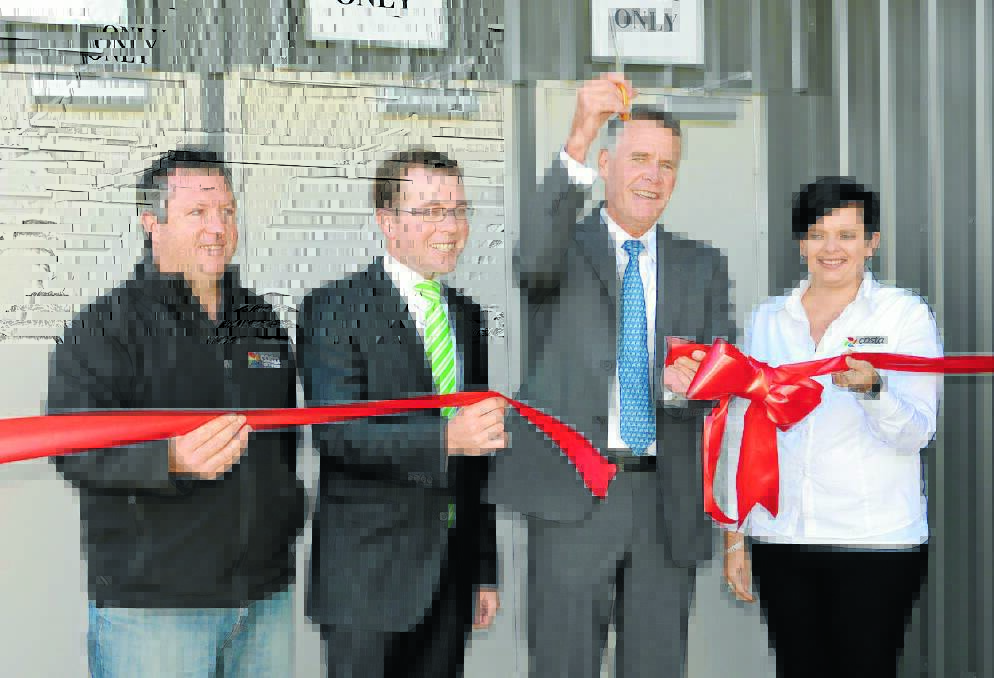 A GROWING CONCERN: The official opening of the new staff entrance at Guyra’s Costa Tomato Exchange are, from left, project engineering manager Rodney Merritt, member for Northern Tablelands Adam Marshall, Deputy Premier Andrew Stoner, and Costa payroll officer Baillie Rolff.