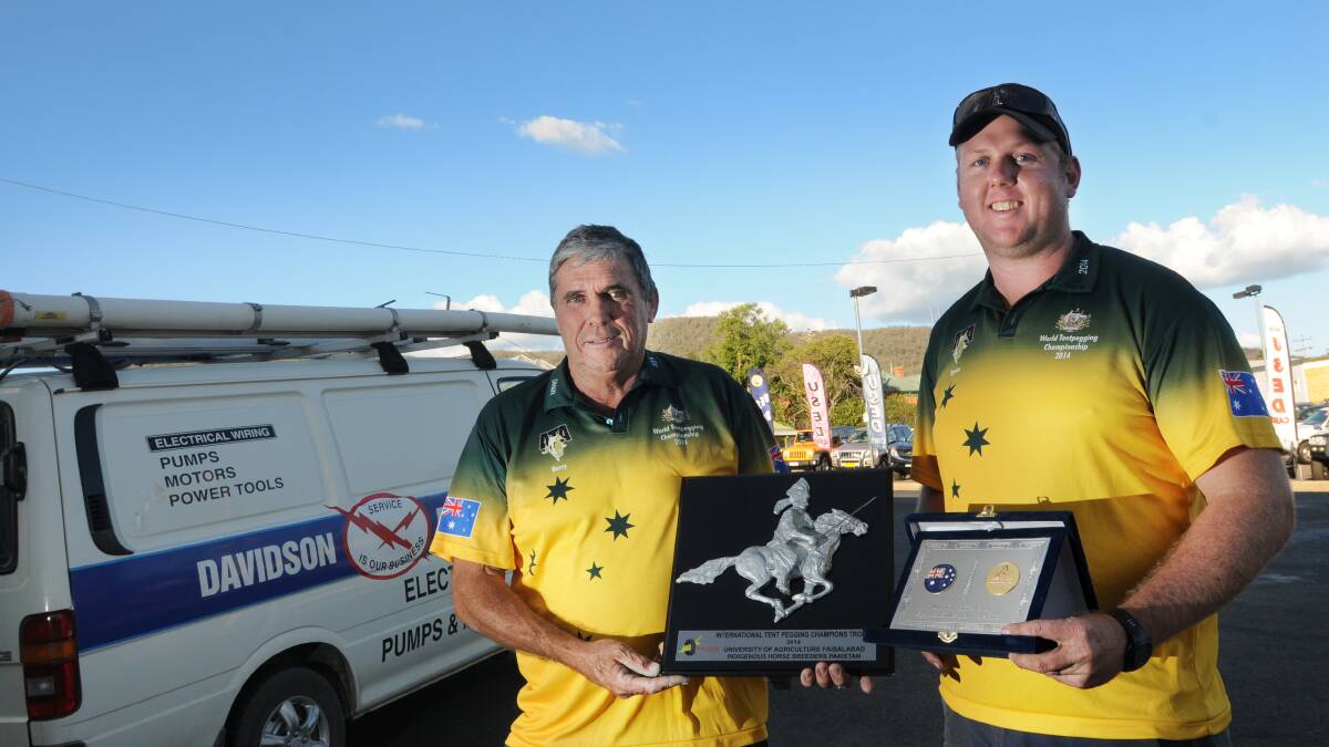 Barry Biffin and Bryson Roser with some of the trophies they have received after representing Australia in Pakistan and then Oman for the World Tentpegging Championships.  Photo: Gareth Gardner 170414GGF01