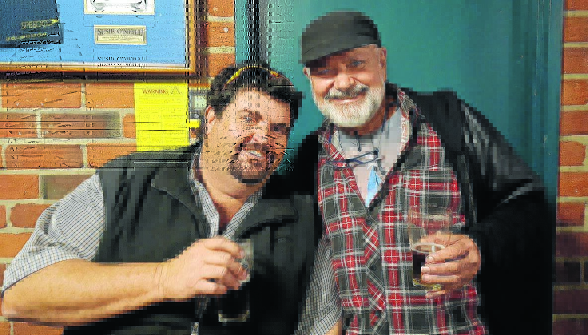 BEER BUDDIES: Simon Ware and Dave Pianoman caught up for a beer or two at the CCMA Jam on Thursday night.
