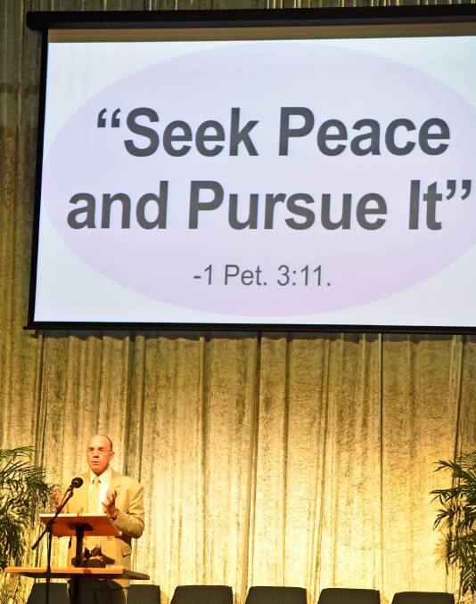 SEEKING PEACE: Sydney minister Bill Sharpe giving an address at the Jehovah's Witness assembly in Tamworth on Sunday. Photo: Geoff O'Neill 240515GOF01