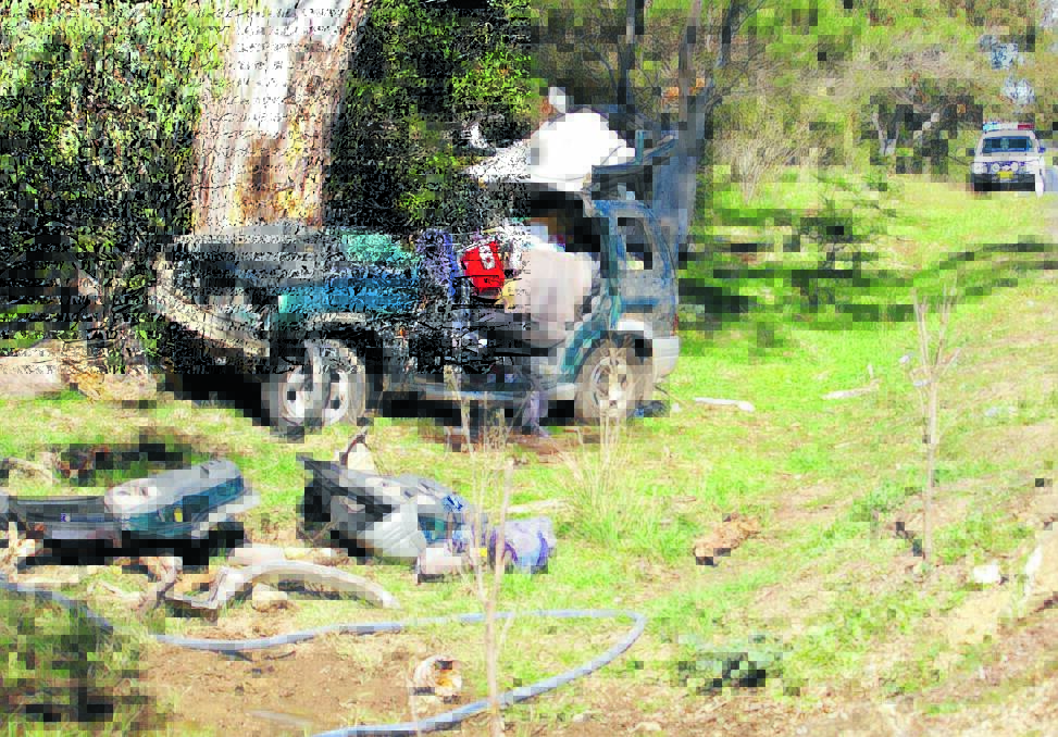 CRUMPLED MESS: The wreckage of the Suzuki was barely recognisable after the crash trapped the driver near Walcha yesterday morning. Photo: Walcha News