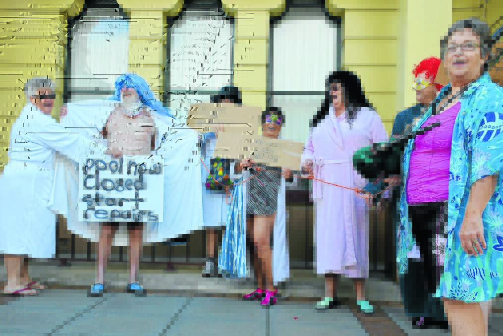 NAKED TRUTH: Protesters bare it all – or at least some of it – in front of Glen Innes Town Hall earlier this month to take a stand against issues with the local pool.