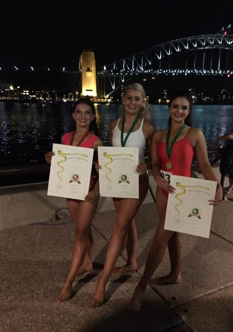 Physie and DanceTamworth’s (L-R) Kiara Northey, Shelby Botfield-Mohr and Taylor Johnston show off their national finals placing awards.