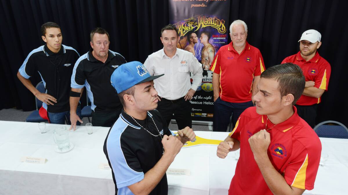 Josh ‘Monster’ Moncaster and Lynken ‘Dynamite’ Dickson shape up before their Central NSW title fight with (from left)  Isaiah Spearim, Paul Saunders, Brian Muller, Mike Abra and Chris Dickson in the background. Photo: Barry Smith 080514BSD14