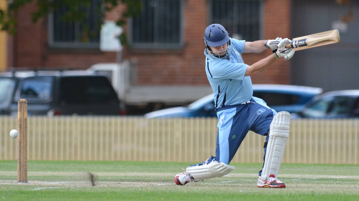 South Tamworth’s Troy Osborne looks to sneak this through the slips. Photo: Barry Smith 070314BSD01